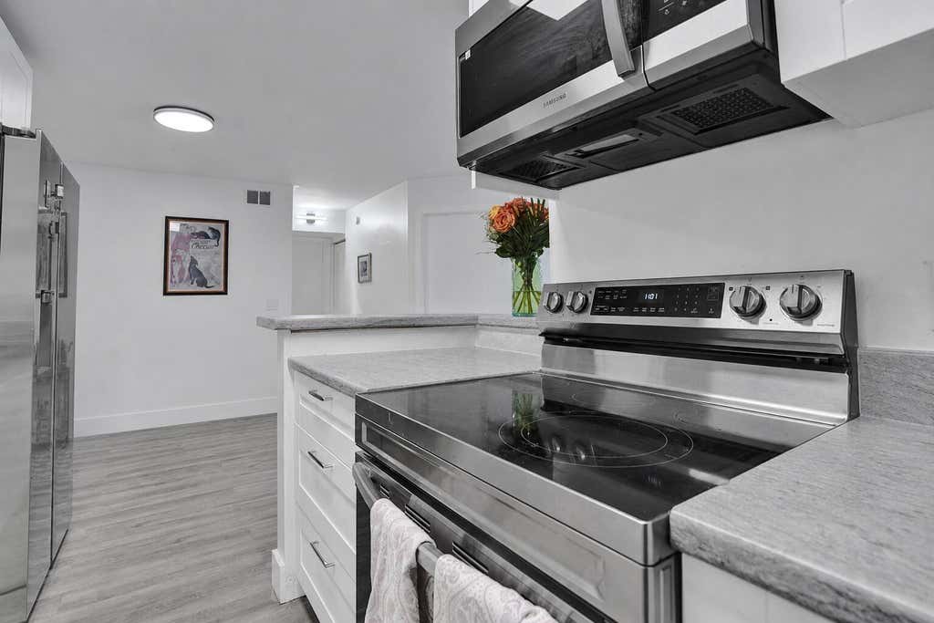Photo of 545 TRACE Circle #101, Deerfield Beach, FL 33441 (MLS # B26063426)