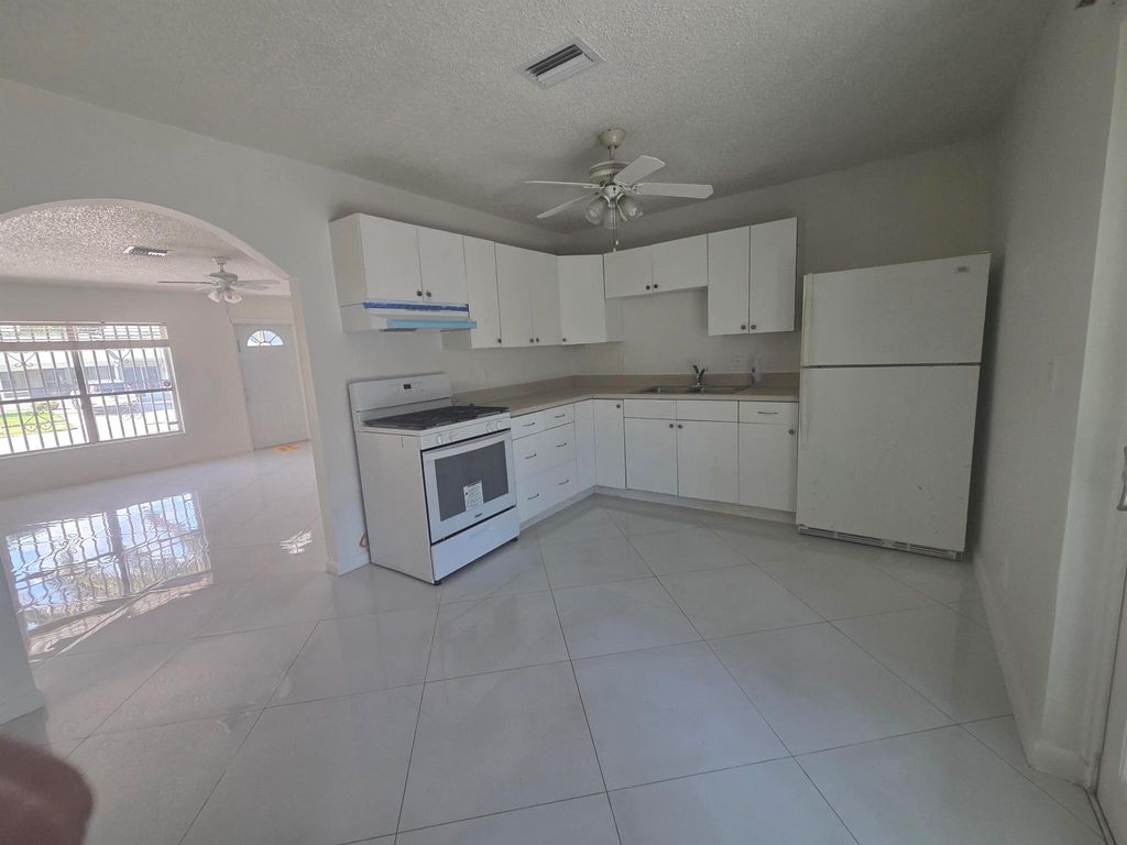 Photo of 6186 Winrock Road, Lake Worth, FL 33463 (MLS # R11082231)