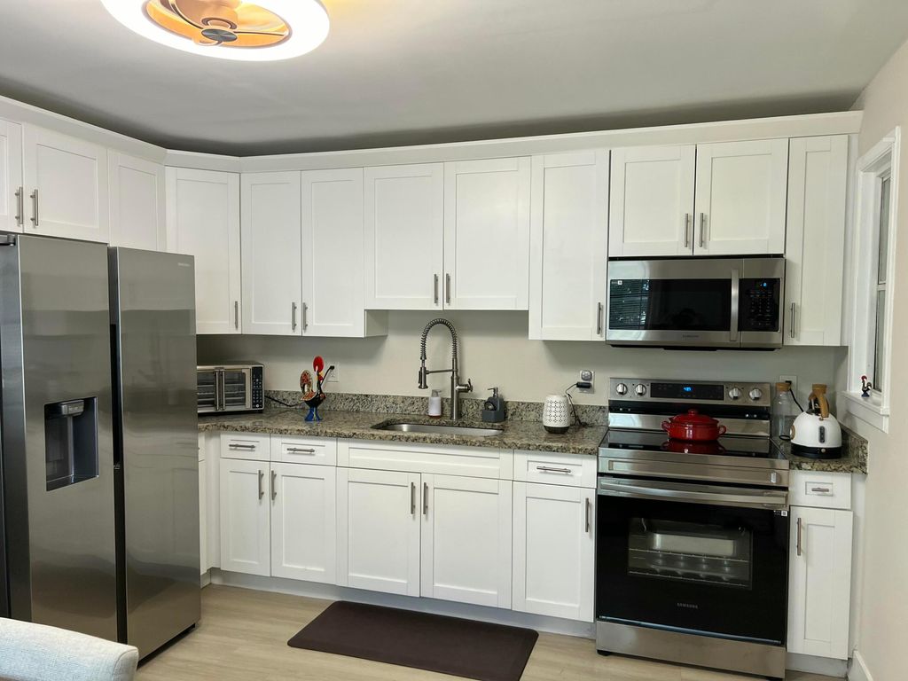 Photo of 707 S Pine Street, Lake Worth Beach, FL 33460 (MLS # R11045322)