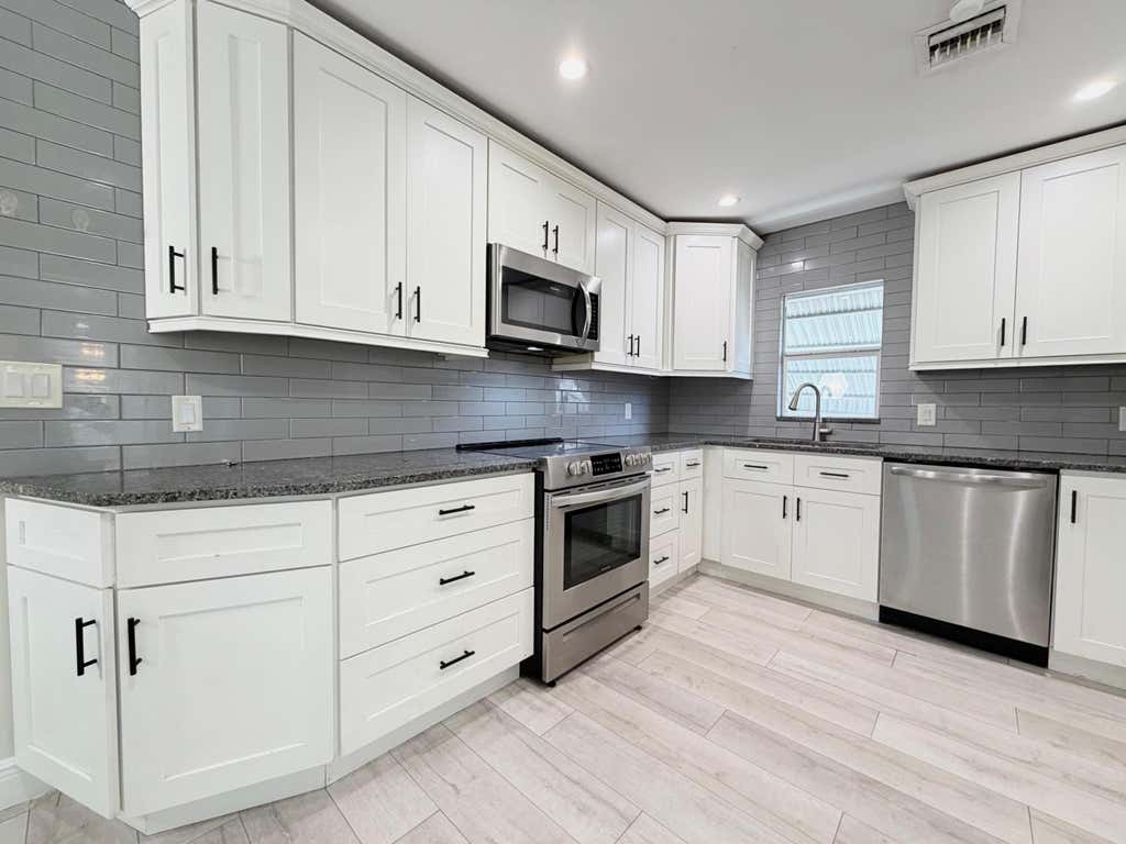 Photo of 528 N J Street, Lake Worth Beach, FL 33460 (MLS # B26065272)