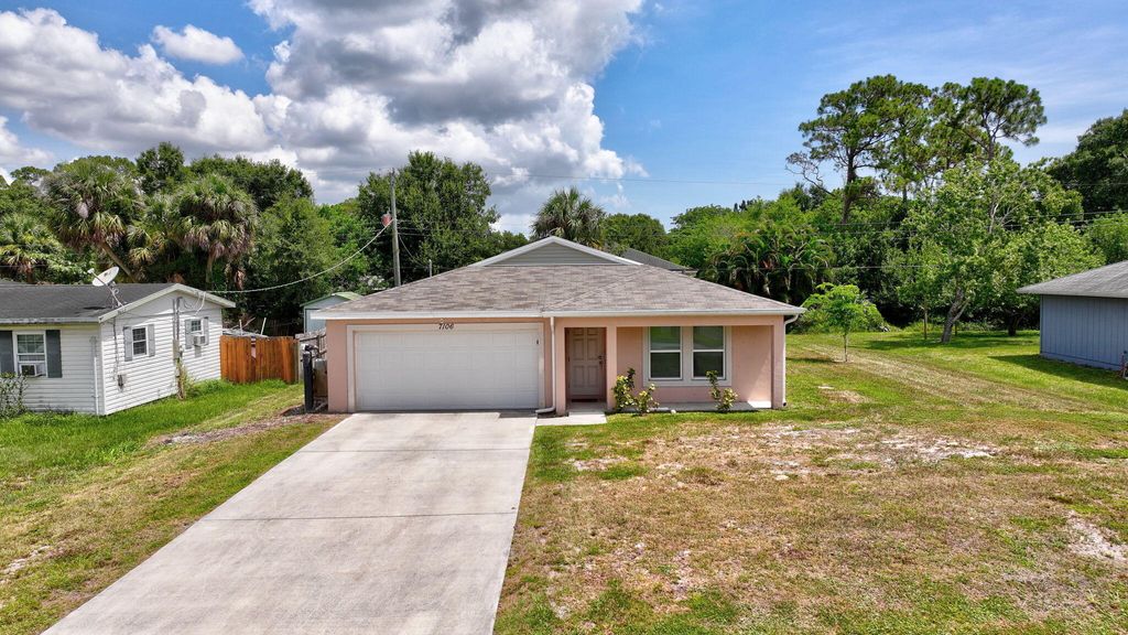Photo of 7106 Lakeland Boulevard, Fort Pierce, FL 34951 (MLS # B26008472)