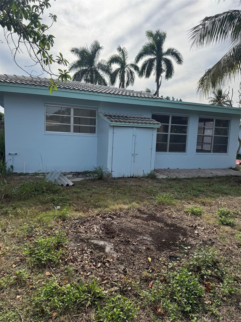 Photo of 439 NE 33rd St, Boca Raton, FL 33431 (MLS # F10540560)