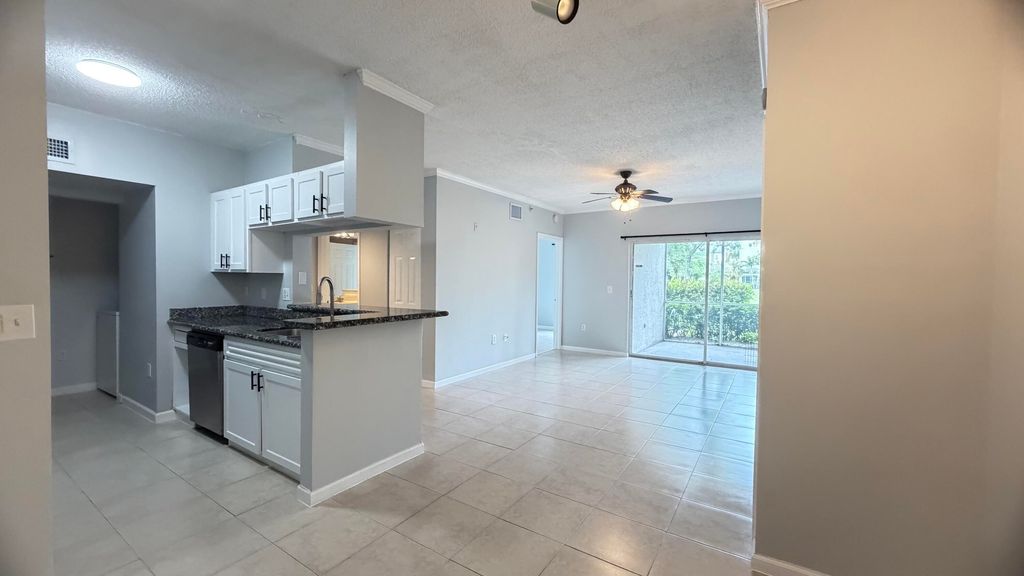 Photo of 11661 W Atlantic Boulevard, Coral Springs, FL 33071 (MLS # B26019640)