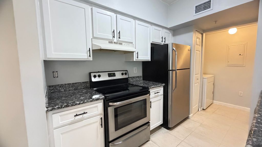 Photo of 11661 W Atlantic Boulevard, Coral Springs, FL 33071 (MLS # B26019640)