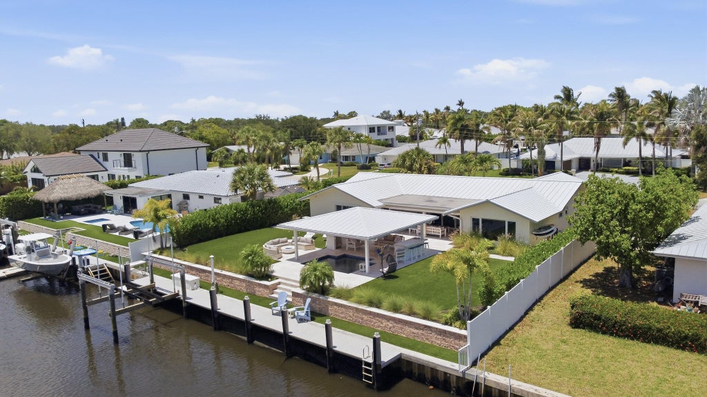 Photo of 16 Leeward Circle, Tequesta, FL 33469 (MLS # R11159757)