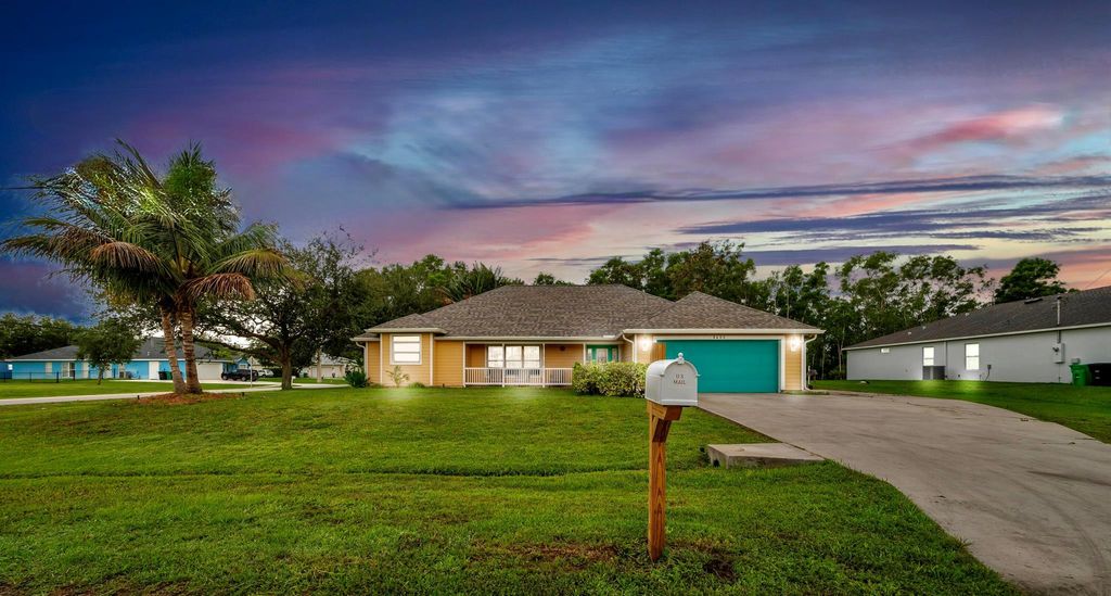 Photo of 5400 NW Rugby Drive, Port Saint Lucie, FL 34983 (MLS # R11096708)