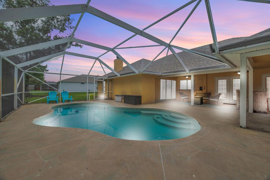 Photo of 5400 NW Rugby Drive, Port Saint Lucie, FL 34983 (MLS # R11096708)