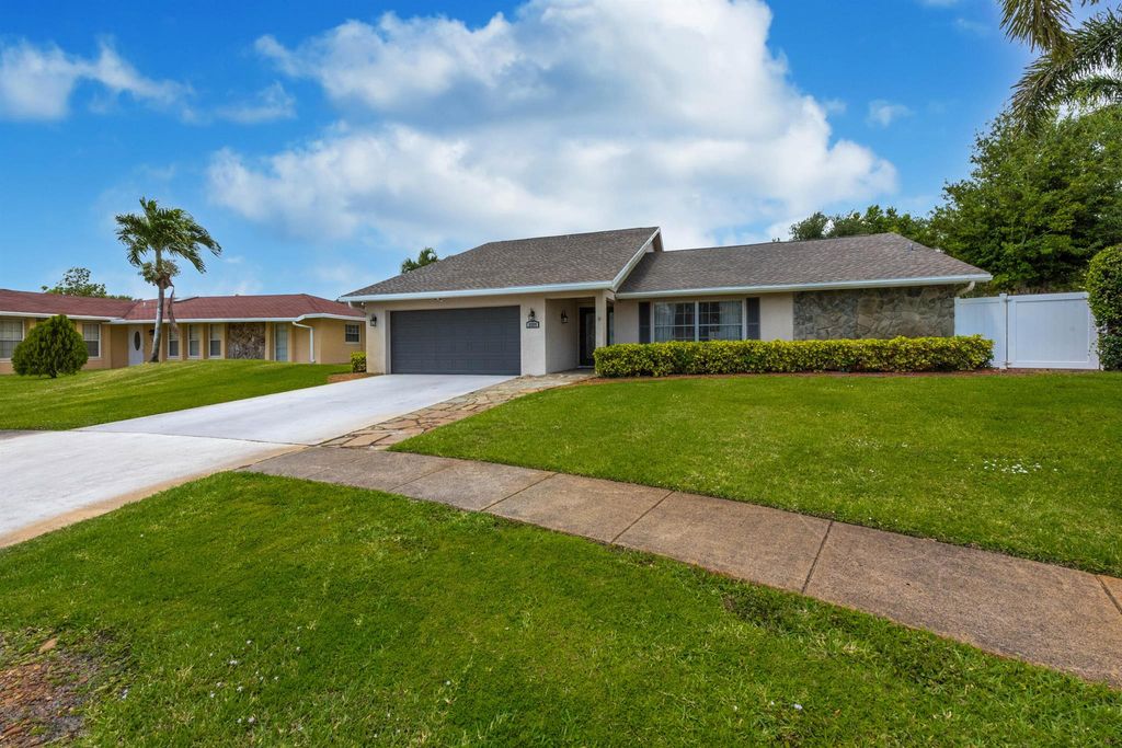 Photo of 2599 W Carandis Road, West Palm Beach, FL 33406 (MLS # R10977522)