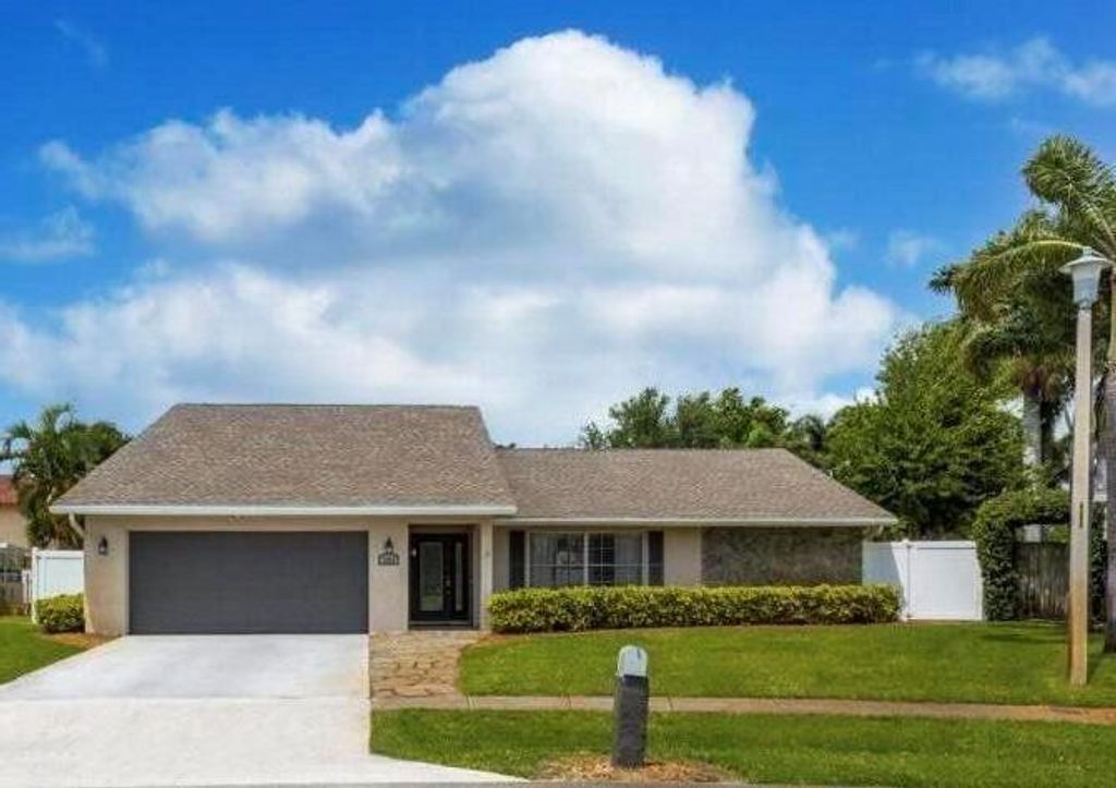 Photo of 2599 W Carandis Road, West Palm Beach, FL 33406 (MLS # R10977522)