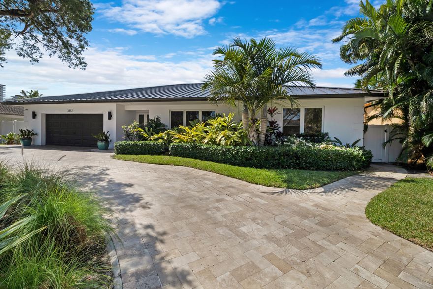 Stunning 2,682 sqft 4BR/3BA custom Rutenberg ranch in highly sought-after Bermuda Riviera on A1A, offering direct ocean access with no fixed bridges and deeded beach access. Proven income-producing property with successful Airbnb history. Designed for both everyday living and entertaining, this home features a gourmet kitchen, marble and wood flooring, formal dining with a custom built-in china cabinet, two spacious living areas, and a stylish wet bar. The split floor plan provides privacy, highlighted by an expansive primary suite with Jacuzzi tub, separate shower, and a walk-in closet with custom built-ins. Major upgrades include a new metal roof, new AC, brand new kitchen appliances, full impact windows, new impact doors to backyard, updated bathrooms, two tankless water heaters, and central vacuum. Located in the Bayview Elementary district and just a short walk to the beach, dining, and nightlife of Lauderdale-by-the-Sea.  Lauderdale-by-the-Sea, known for its small-town coastal feel, this seaside enclave features a beautifully maintained beach, a vibrant yet relaxed downtown, and a welcoming atmosphere that blends residents and visitors alike. The beachfront area is anchored by the iconic Anglin's Square, where you'll find open-air dining, live music, cafés, and boutique shops all just steps from the sand. The town is especially known for its easy ocean access and is a favorite for snorkeling and diving, with a living coral reef located just offshore—no boat required. El Prado Park and the beachfront promenade provide scenic spaces for walking, biking, and enjoying the ocean breeze, while frequent community events create a lively yet intimate social scene. For commuters, you'll have easy access to all major South Florida airports. FLL is approximately a 15-20 minute drive, MIA is about 35-50 minutes away, and PBI can be reached in roughly 40-55 minutes.