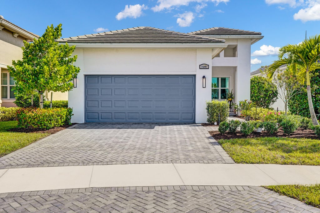 Photo of 25007 SW Alberti Way, Port Saint Lucie, FL 34986 (MLS # B26031018)