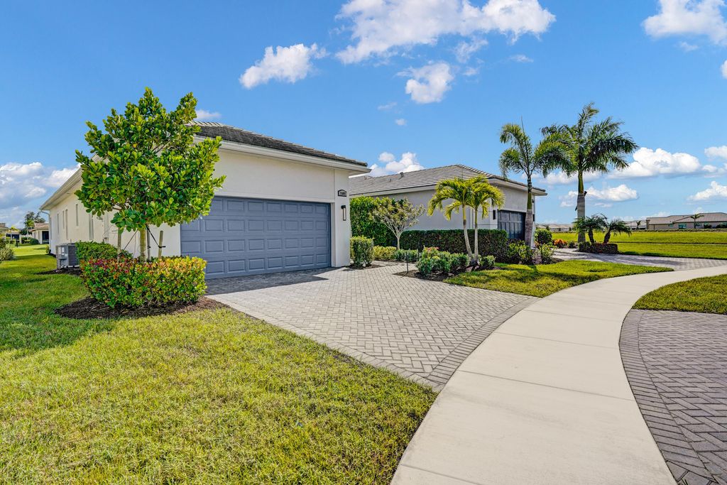 Photo of 25007 SW Alberti Way, Port Saint Lucie, FL 34986 (MLS # B26031018)