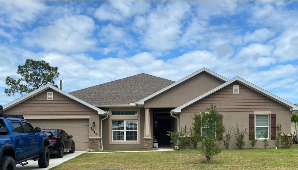 Photo of 1919 SW Sylvester Lane, Port Saint Lucie, FL 34984 (MLS # R10982728)