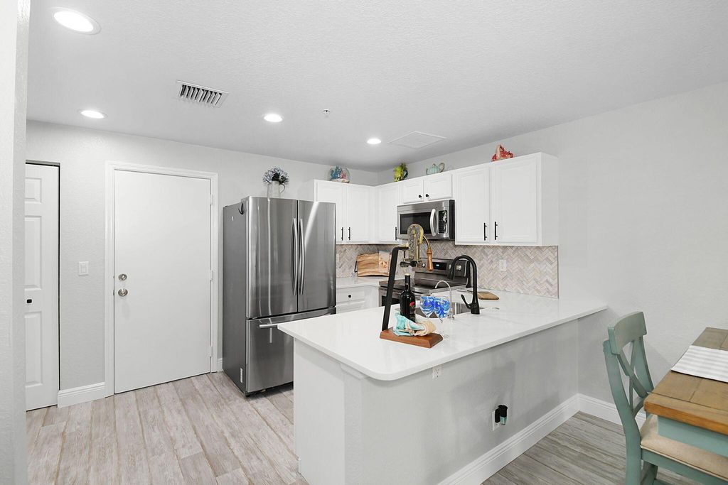 Photo of 5355 SE Mitchell Lane, Stuart, FL 34997 (MLS # R11116763)