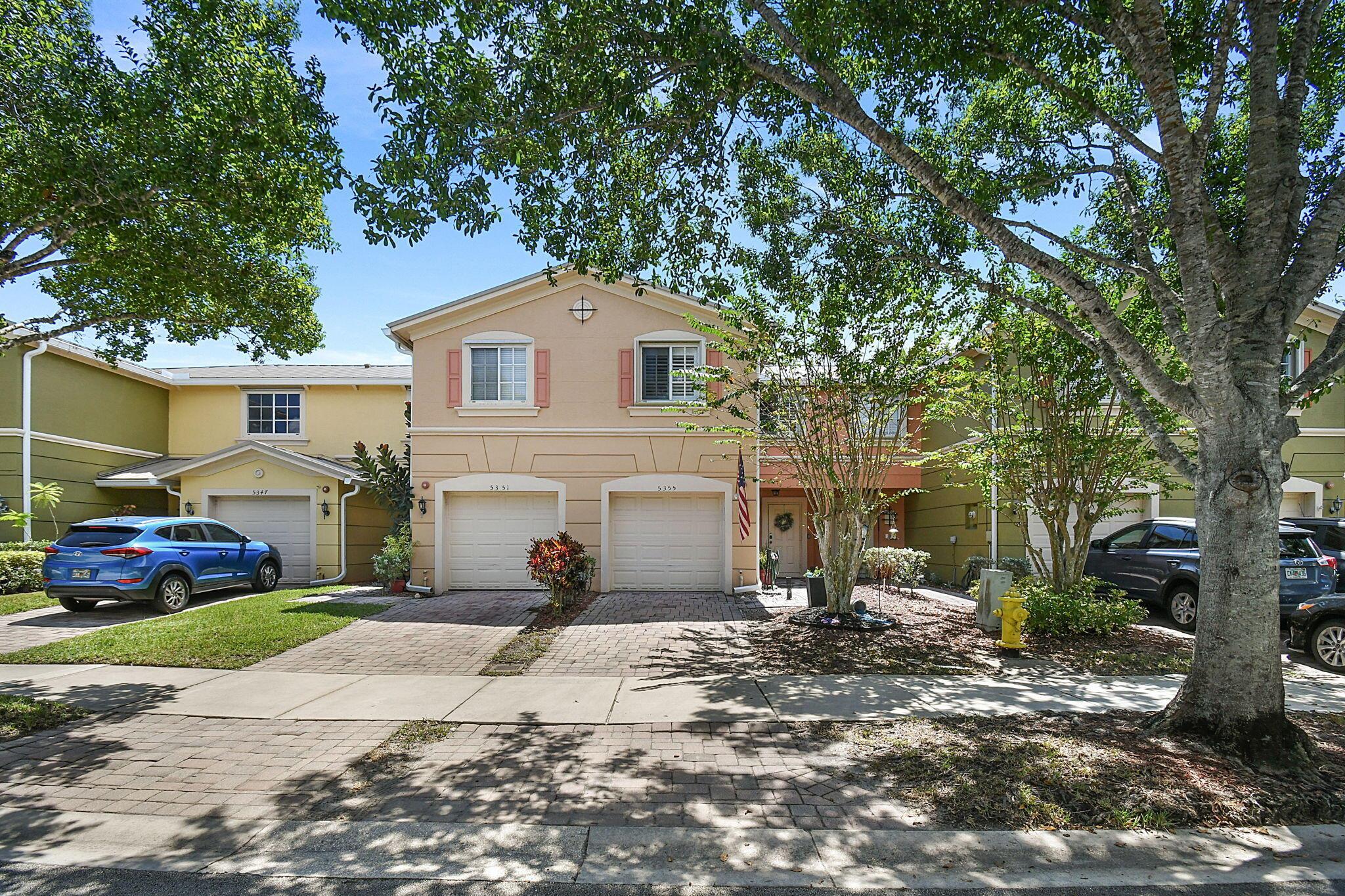 Experience modern comfort in this fully upgraded townhouse in Martins Crossing. The kitchen features stainless steel appliances, corian counter tops, and a reverse osmosis water system, creating a bright and functional space for cooking and entertaining. The bathrooms have been beautifully remodeled and the unit boasts vinyl plank flooring for a seamless, low maintenance finish. Bahama shutters add a touch off class and function for the space. Recent exterior upgrades include a new roof, gutters, accordion shutters and an extended patio to enjoy your outdoor living space.Martins Crossing is an active community with low HOAfee that include lawn care, cable, internet, clubhouse, two pools, and a fitness center-offering convenience and lifestyle all in one.