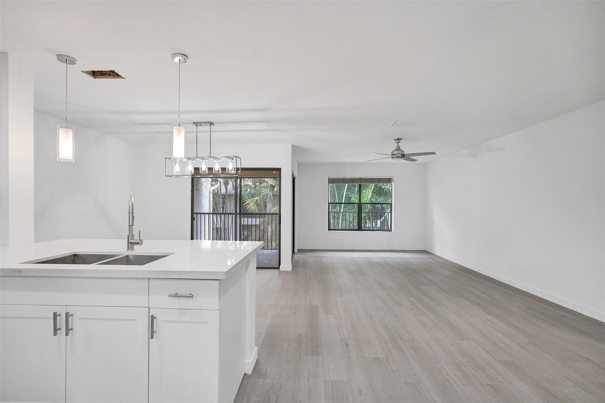 Discover this fully renovated 2-bedroom, 2-bathroom condo in the sought-after Pond Apple Place subdivision of the Township Community. The home features a spacious living and dining area that flows into the updated kitchen, including new appliances and modern finishes. The large primary suite includes a large walk-in closet and dual sinks for added convenience. This property also includes a private screened-in porch and ample guest parking!
Additional amenities include a large clubhouse featuring a 2-story gym, Olympic lap pool, library, sports courts, and so much more! Pond Apple Place II also has its own small community pool for convenience!