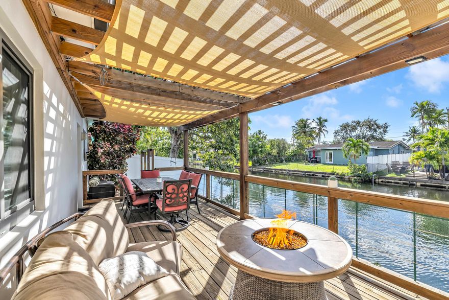 Minutes from Wilton Manors, the beaches, and downtown Oakland Park, this waterfront property offers the ideal balance of convenience and lifestyle.With over 2,100 square feet of thoughtfully designed living space, the home is perfect for both comfortable living and sophisticated entertaining. Features include a sleek metal roof, impact windows and doors, and a spacious two-car garage. The open floor plan flows seamlessly to a custom deck and pergola, creating the perfect setting for weekend gatherings or quiet evenings outdoors.With no HOA restrictions, owners can enjoy true independence and flexibility.