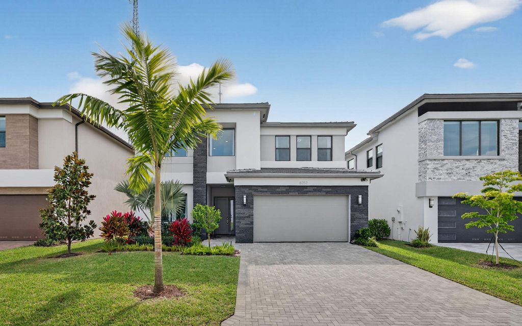 Photo of 8252 Essex Country Club Drive, Boca Raton, FL 33434 (MLS # B26032091)