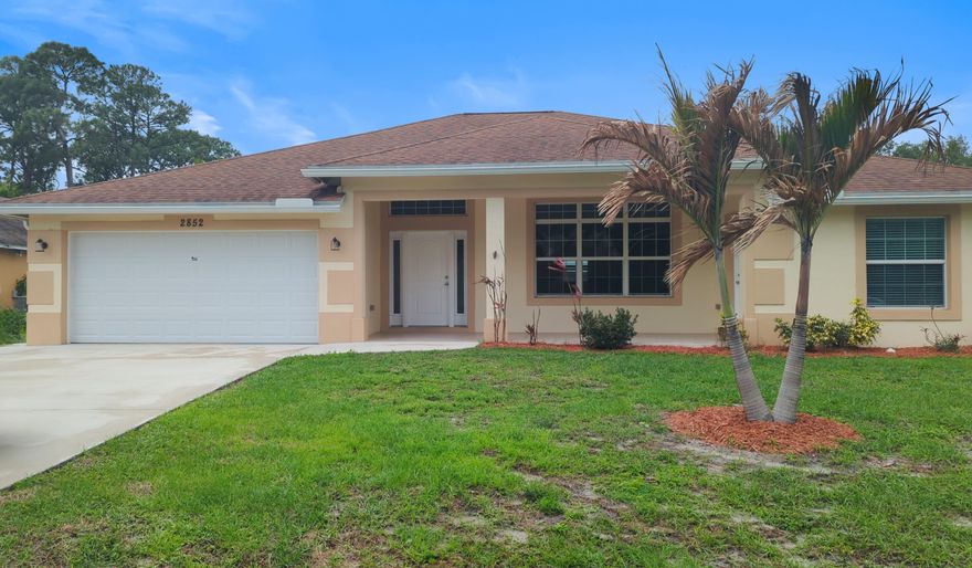 Modern Luxury 4/3.5/2 with a Pool, In-Law Suite & Spa!! CBS construction, 2223 SF, built in 2021. Enjoy the large fenced yard, Saltwater Pool with waterfalls, separate  hot tub, covered patio, outdoor shower and cabana bath without the need to step inside the main house. NO HOA. The oversized lot gives you room for your all your toys!. Inside, find a beautiful kitchen with quartzite counters, stainless steel appliances, farm sink and tile backsplash. The open layout features luxury vinyl/tile floors, and beautifully detailed tray ceilings. This home features a private in-law suite with separate entrance, dual walk-in closets in master, and shaded patios front and back. A true Florida retreat awaits.