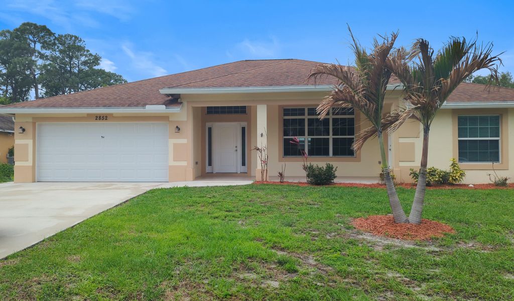 Photo of 2852 SW Collings Drive, Port Saint Lucie, FL 34953 (MLS # B26026368)