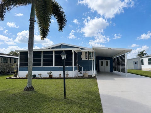 Photo of 2502 SW VERSAILLES Terrace, Stuart, FL 34997 (MLS # B26072171)