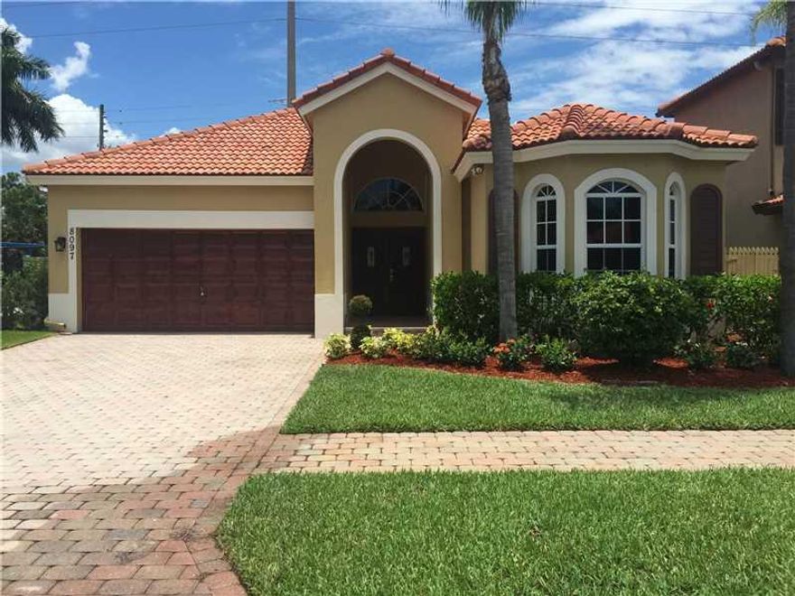 Heres a chance to live in Gateway Palms for a fraction of what the new construction sells for.  This home has been completely renovated to the custom made kitchen and bathrooms, new Hardwood Floors new landscaping, new AC inside and out, and paint inside    and out...too many upgrades to list you don't want to miss this home Schedule a showing today!!