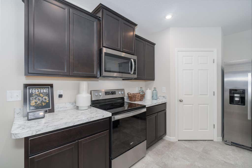 Photo of 232 SW Milburn Circle, Port Saint Lucie, FL 34953 (MLS # R10959244)