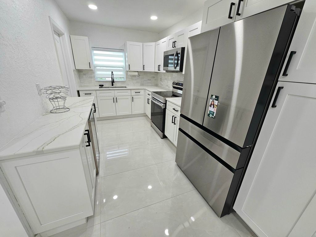 Photo of 7304 Westwood Drive, Tamarac, FL 33321 (MLS # R11168639)