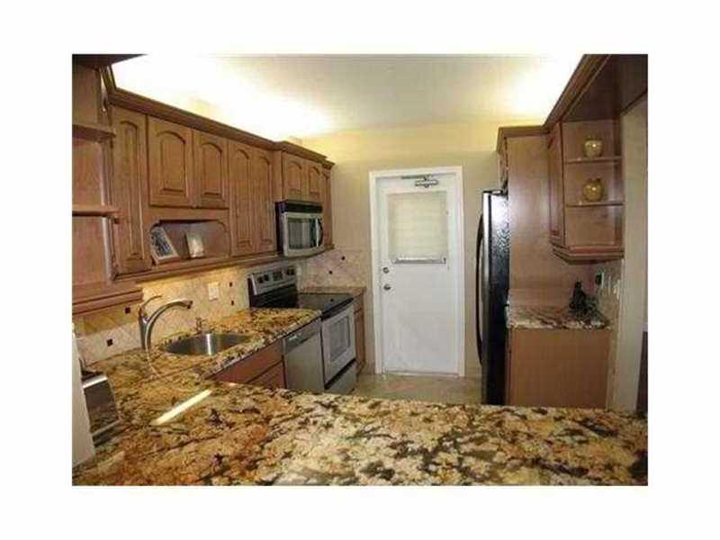 PALM-AIRE C C APTS 42 CON - Residential Lease