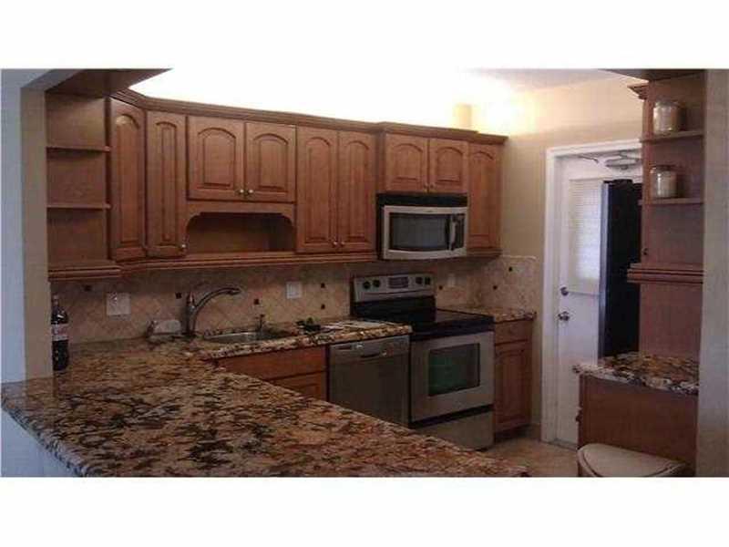 PALM-AIRE C C APTS 42 CON - Residential Lease