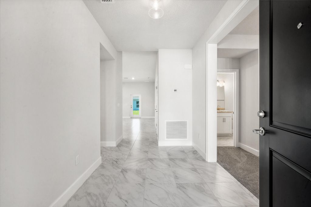 Photo of 8603 Giovanni Avenue, Fort Pierce, FL 34951 (MLS # B26026198)