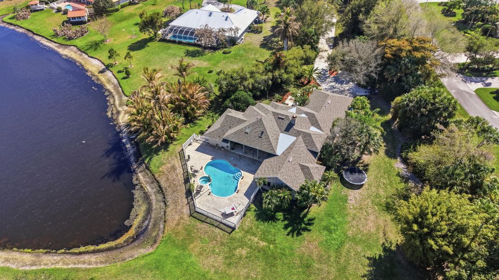 Photo of 2400 NW Lakeridge Drive, Palm City, FL 34990 (MLS # R11168946)