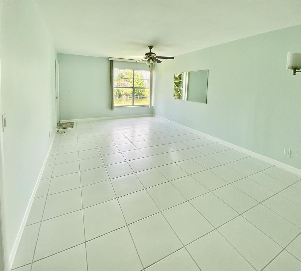 Photo of 12023 W Greenway Drive #105, Royal Palm Beach, FL 33411 (MLS # R11001548)