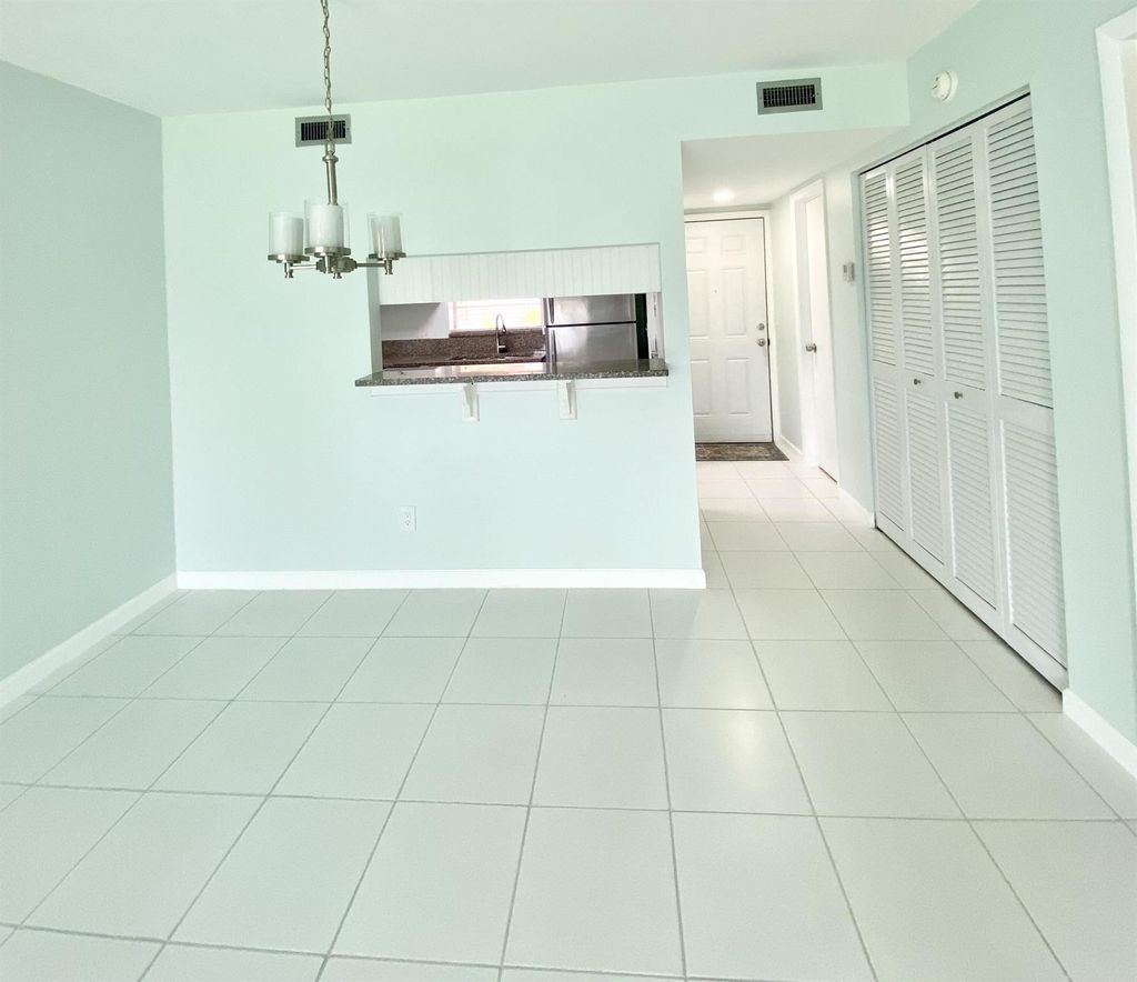 Photo of 12023 W Greenway Drive #105, Royal Palm Beach, FL 33411 (MLS # R11001548)