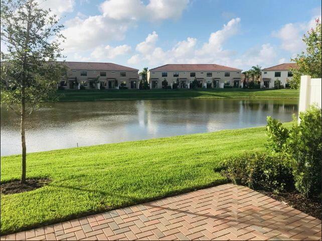 Lakefront 2-story luxury townhome in the newly built, gated community Enclave at Boca Dunes. Resort-style amenities including pool, spa, clubhouse, fitness center, golf courses, park&playground. Perfect location, A rated schools, convenient to all major highways, airports, dining, entertainment and the beach. Barely lived in home with an Open Concept Kitchen with stainless steel appliances, granite countertops, oversized island. Living room and master bedroom overlooking the lake. Oversized master bedroom with walk-in closet, luxurious master bath with double sinks. Loads of storage closet. 1 car garage, 2 cars driveway. All windows, doors, garage door hurricane impact. All dimensions are approximate. HOA approval required.