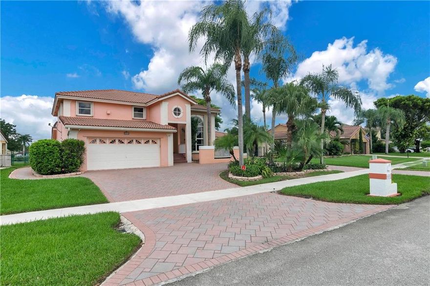 Outstanding lakefront 3 bedrm,3-1/2 bath,2 car garage pool home located in Falcon's Lea Comm.This amazing home features 1st floor Master Suite with remodeled bath & custom wood cabinets,formal living/dining,family room/breakfast area, remodeled kitchen with custom wood cabinets & granite countertops, SS appliances.French doors open to screened pool/patio/greenhouse area,laundry room,1/2 bathrm. 2nd floor features 2nd Master bedrm,3rd bedrm,spacious loft can be converted to 4th bedrm & space for office/game room, ceramic & bamboo floors, circular paver driveway, appealing landscaping with exceptional landscaping lights,accordion shutters,2AC,roof 2007, alarm/cameras system,low HOA $355 yearly,A+ schools,close to major highways,Publix shopping centers,Pembroke & Sawgrass Malls and much more!