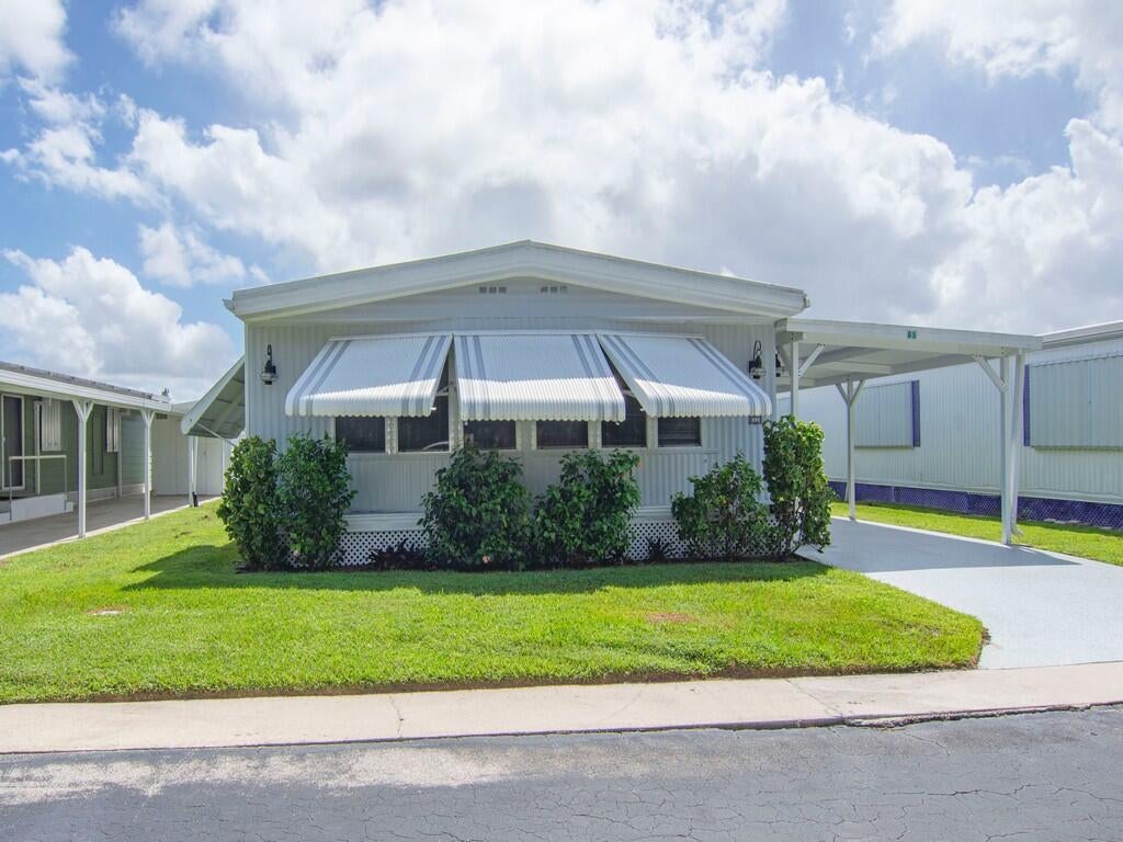 Photo of 4800 SE FEDERAL HWY Highway #65, Stuart, FL 34994 (MLS # B26081200)