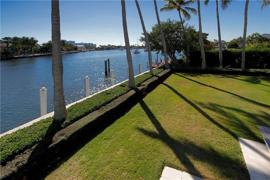 This stellar property features 150' of prime Fort Lauderdale waterfront on the banks of Lake Sylvia in exclusive Harbor Beach. The lake, a picturesque body of water with no fixed bridges, is frequented by pleasurecraft and connected to the Intracoastal Waterway nearby, perfect for the owner of a large boat with ample dockage for a megayacht. The 18,750 sq ft lot, situated on one of the finest and most private residential streets in the city, enjoys a desirable southeast exposure to take in the prevailing breezes coming in off the Atlantic, located just east across the beach road A1A. Port Everglades inlet is just ten minutes away by boat. The property is perfect for building a new home, while the existing house has been well maintained with manicured lawns surrounding mature coconut palms.