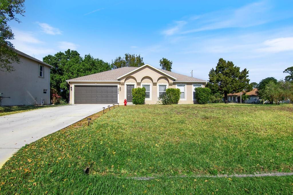 Photo of 1902 SW Erie Street, Port St Lucie, FL 34953 (MLS # R10871922)