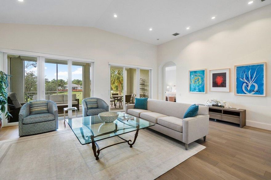 Welcome to luxury living in Ballenisles! This exquisite 3 bedroom, 3 bathroom home plus convertible den offers the epitome of elegance and comfort. Ascend to your sanctuary with ease via the private elevator, and retreat to the serenity of your expansive living area on the upper level. Relish in captivating views from the oversized, screened in balcony overlooking the golf and water vistas. Indulge your culinary desires in the eat-in kitchen complete with updated appliances ( Miele dishwasher, Jenn-Air refrigerator and GE dishwasher ) and reverse osmosis water and carbon filtration system. Experience resort-style living at its finest in The Palms. Full 2 car garage. New wood floors! Close walk to the community pool. Schedule your private showing today!