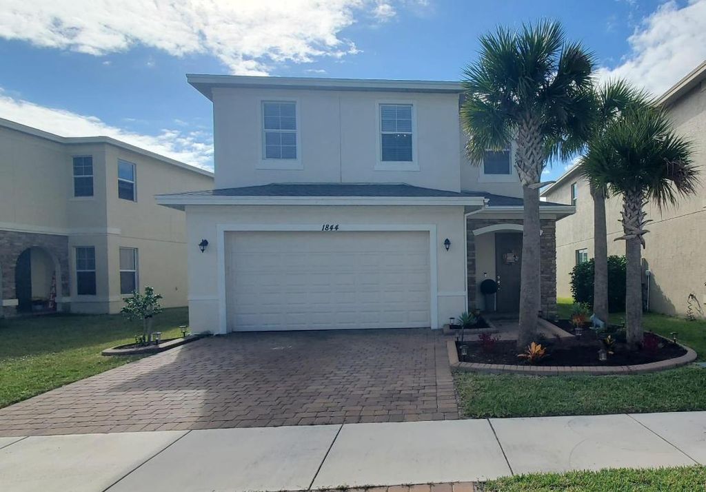 Photo of 1844 NW Cataluna Circle, Port Saint Lucie, FL 34986 (MLS # R11039056)