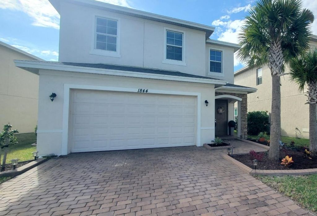 Photo of 1844 NW Cataluna Circle, Port Saint Lucie, FL 34986 (MLS # R11039056)
