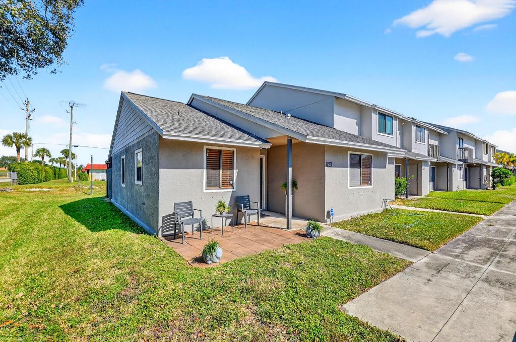 Photo of 6108 Channel Drive, Greenacres, FL 33463 (MLS # R11140883)