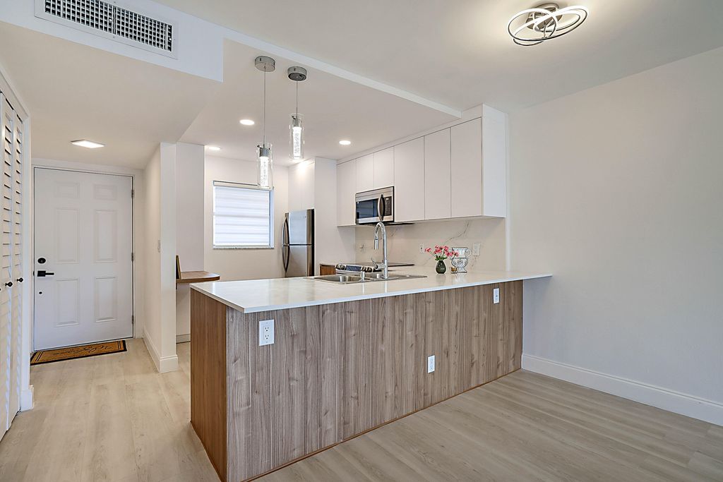 Photo of 3100 Holiday Springs Boulevard #111, Margate, FL 33063 (MLS # B26015671)