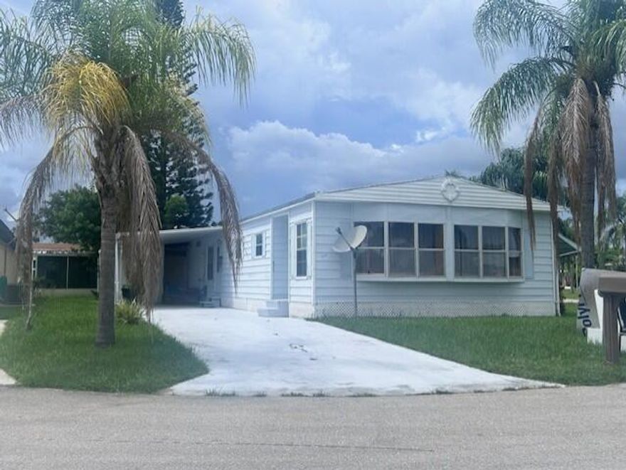 Beautiful Corner Lot Home in Spanish Lakes Riverfront! Welcome to this charming and fully furnished 2-bedroom, 2-bathroom home located on the desirable corner of Violeta and Los Lagos Ln in the scenic 55+ community of Spanish Lakes Riverfront.Offering 1,416 sq. ft. of living space, this spacious home features a comfortable Florida room perfect for morning coffee or evening relaxation. The large living room is ideal for entertaining and comes complete with an elegant electric fireplace that adds a cozy ambiance year-round. The home also boasts a long covered carport, providing ample parking and convenience. With plenty of natural light, tasteful furnishings, and a well-designed layout, this home checks all the boxes for easy Florida living.