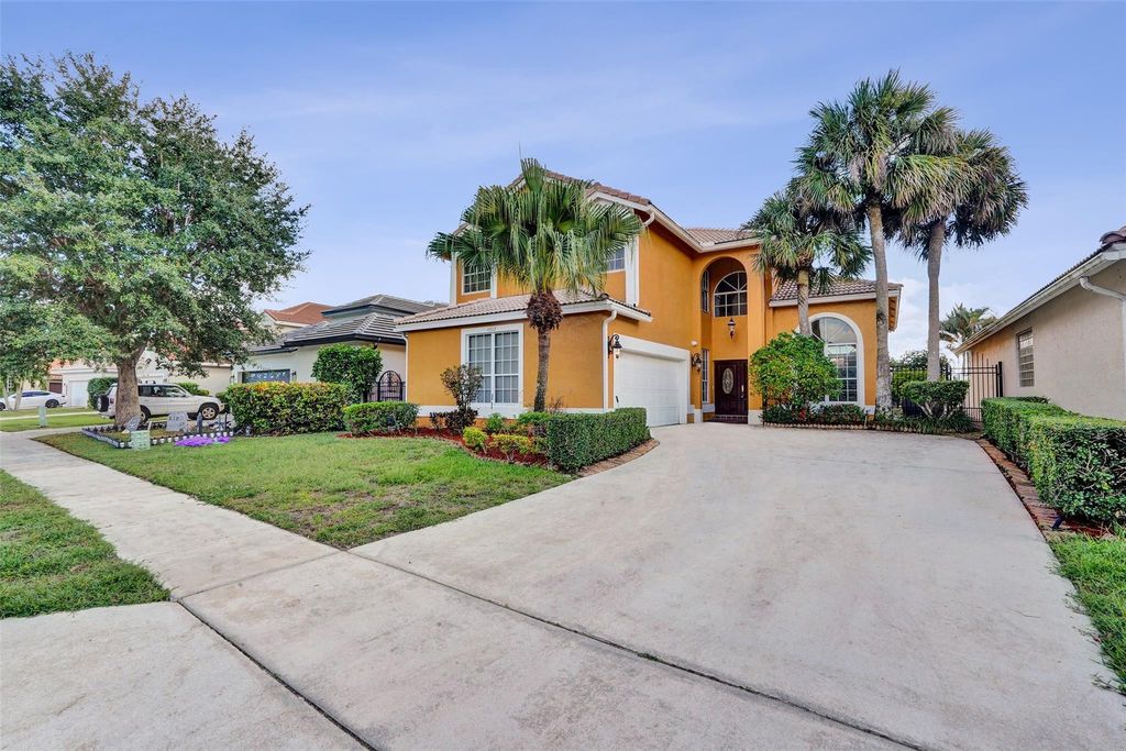 Photo of 10902 Tamoron Lane, Boca Raton, FL 33498 (MLS # B26030019)