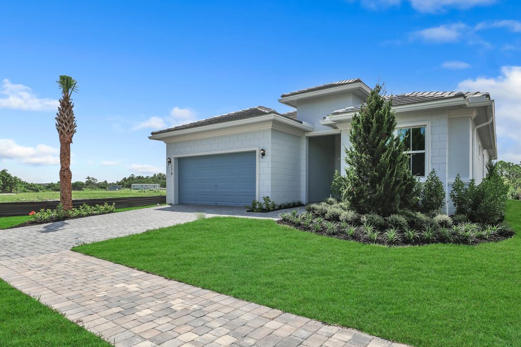 Photo of 134 SE Palma Street, Port Saint Lucie, FL 34984 (MLS # R10898295)