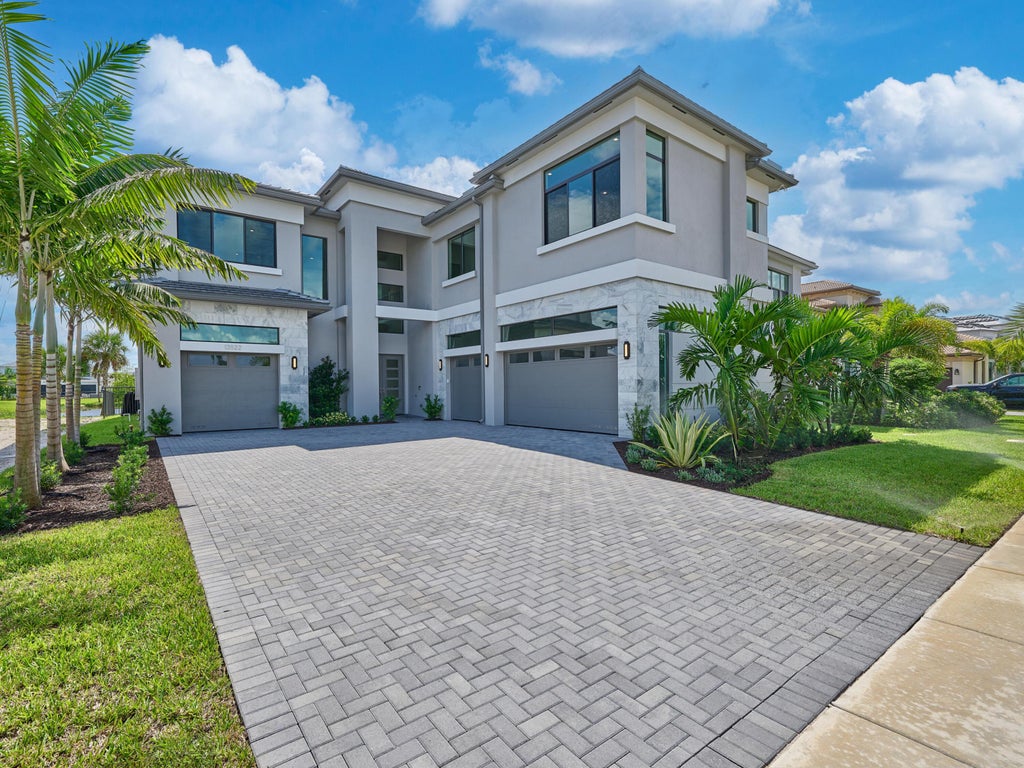 Photo of 13522 Nesting Pines Way, Palm Beach Gardens, FL 33412 (MLS # B26088831)