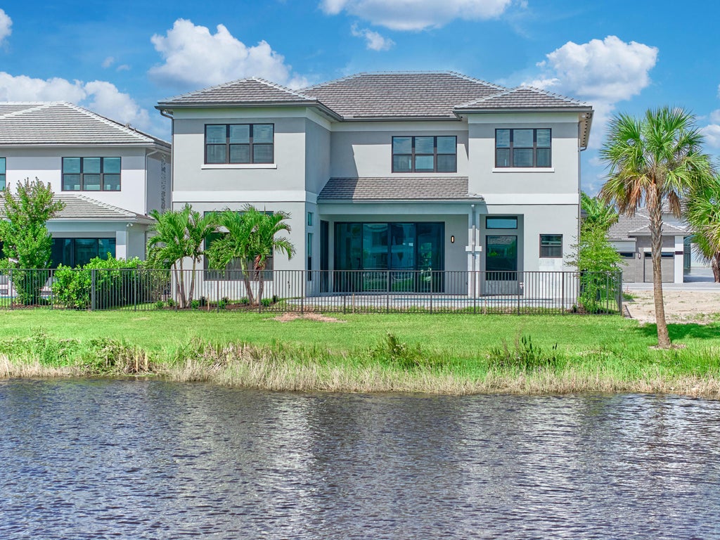 Photo of 13522 Nesting Pines Way, Palm Beach Gardens, FL 33412 (MLS # B26088831)