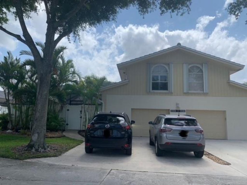 Photo of 5134 Woodruff Ln, Palm Beach Gardens, FL 33418 (MLS # F10286220)